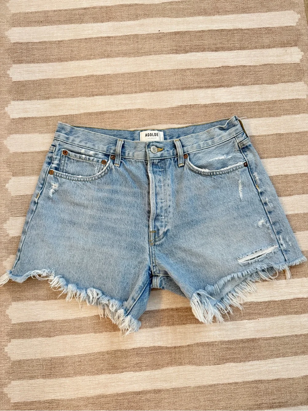 AGOLDE Medium Wash Frayed Hem Denim Cutoff Shorts